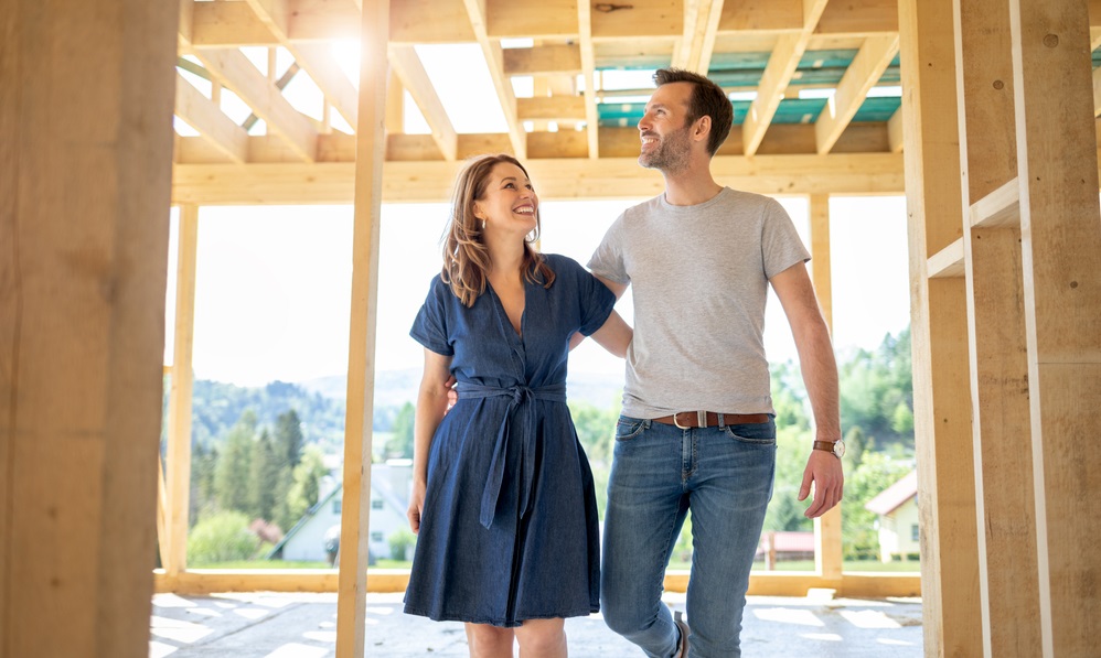 Couple visiting building site